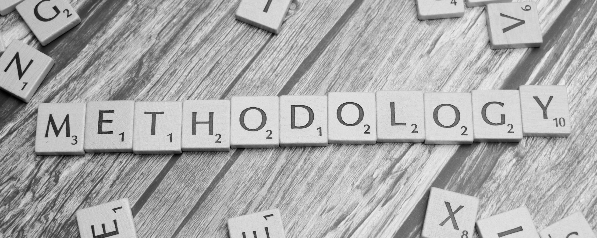 Scrabble pieces that spell out Methodology